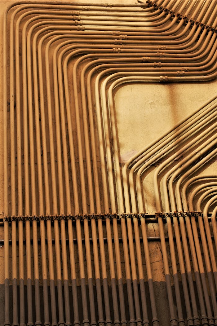 Geometric arrangement of industrial pipes conveying abstract art in San Francisco.